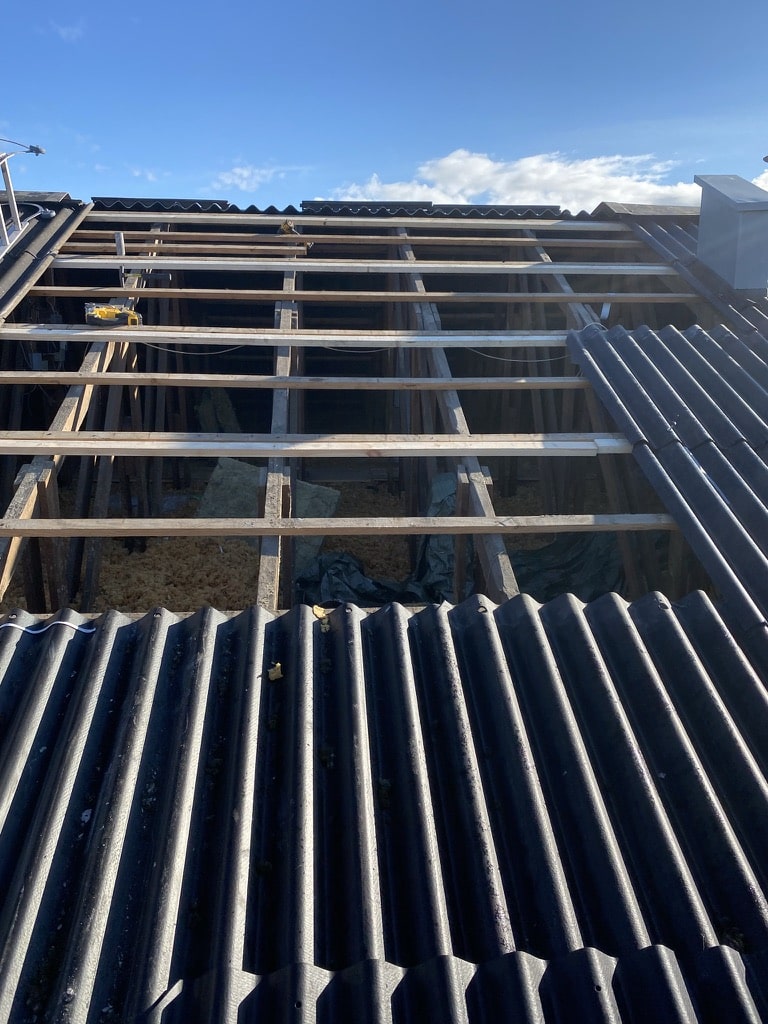 Reparation af  tag Greve